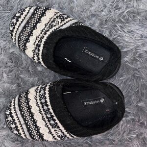 Women’s black and white fuzzy slippers